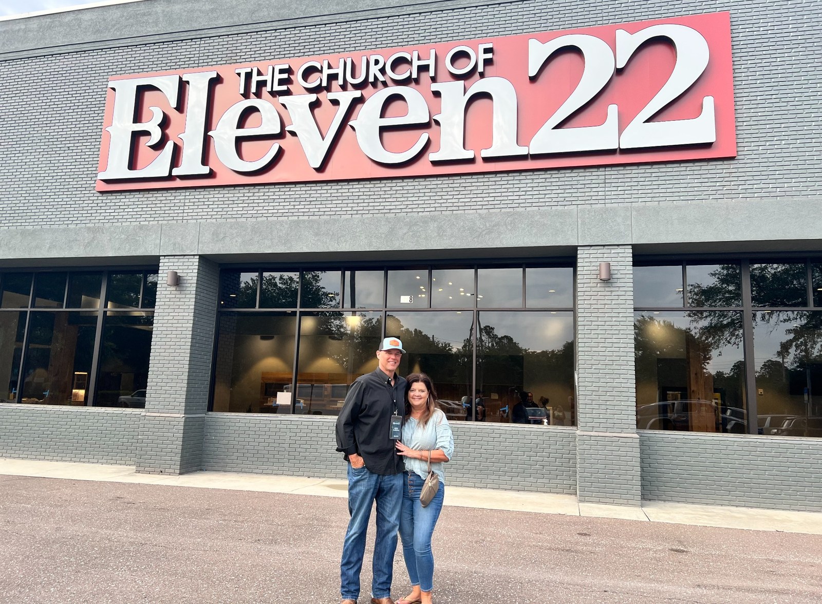Greg and Karen standing outside The Church of Eleven22