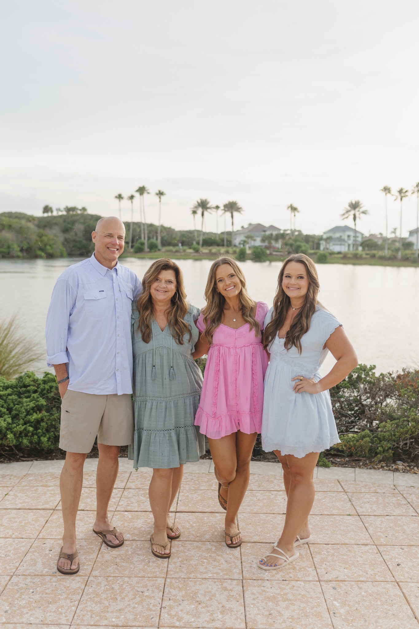 Greg and Karen with their daughters together outdoors
